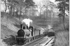 ex-MR 2F no.58148 emerges from Glenfield Tunnel